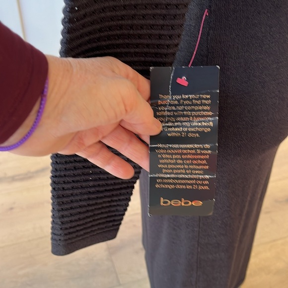 NWT Bebe black fitted knit sweater dress with rolled funnel neck and full lining - Picture 7 of 11